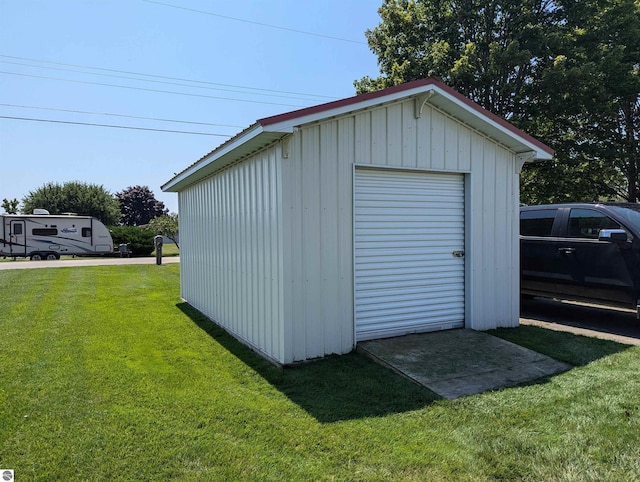 garage with a yard