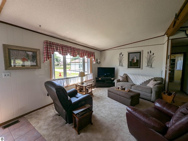 tiled living room featuring crown molding, a textured ceiling, and lofted ceiling