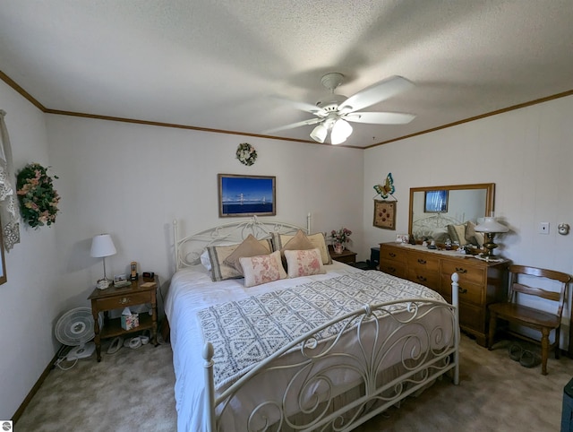 bedroom featuring a textured ceiling, carpet, and ceiling fan