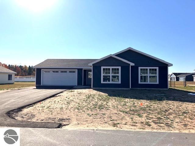 ranch-style home with a garage