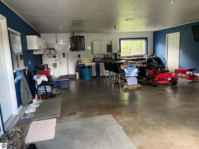 garage with white refrigerator