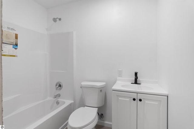 full bathroom featuring toilet, vanity, and  shower combination