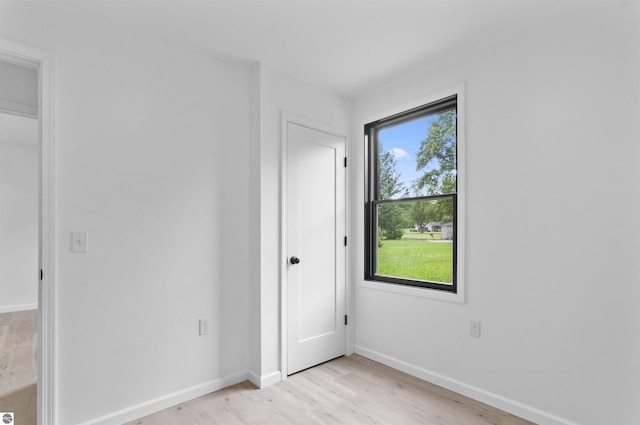 unfurnished bedroom featuring light hardwood / wood-style floors