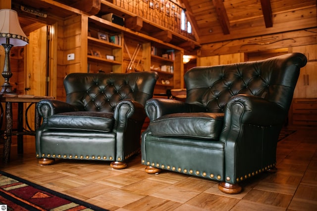 living room featuring parquet flooring and vaulted ceiling with beams