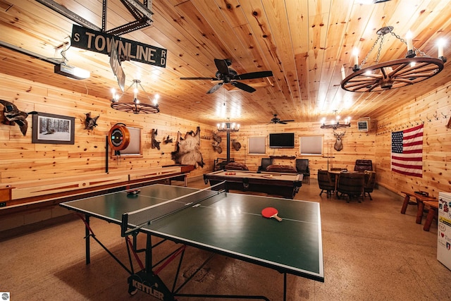 recreation room featuring wood walls, wooden ceiling, and ceiling fan