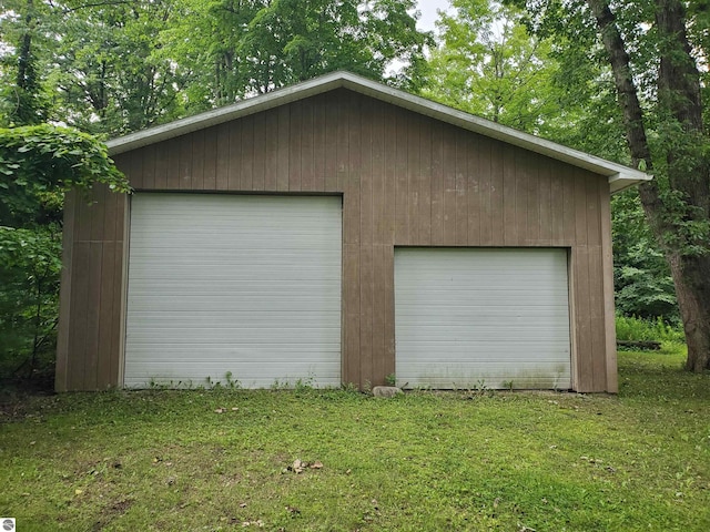 garage with a lawn