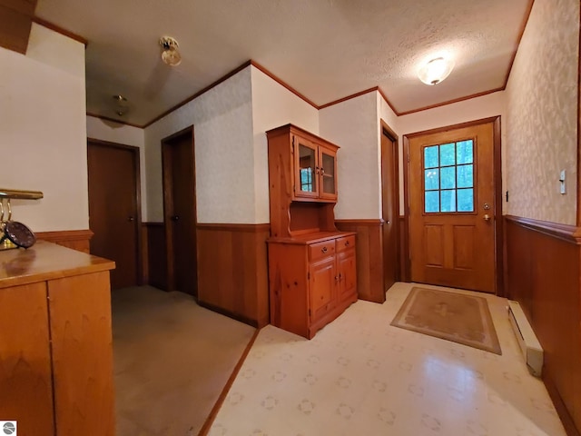 interior space featuring light carpet and baseboard heating