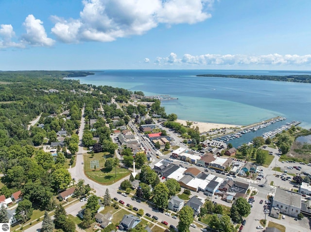 224 Saint Marys St, Suttons Bay, MI 49682 - drone / aerial view featuring a water view