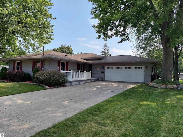 single story home with a garage and a front yard