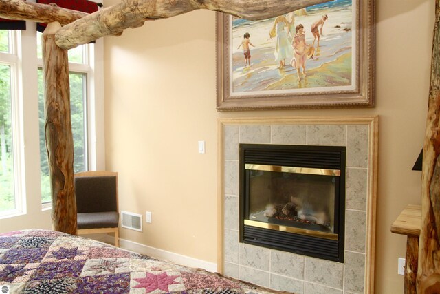 bedroom with a fireplace