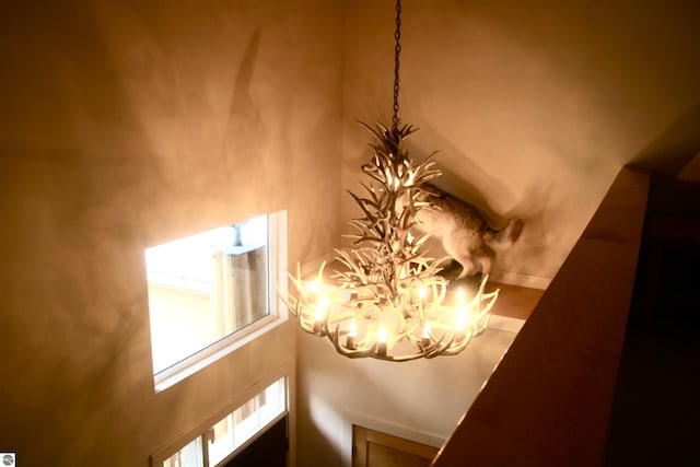 interior details with a chandelier