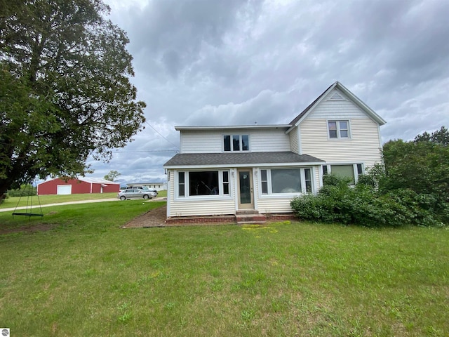 view of front of home with a front lawn