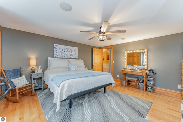 bedroom featuring wood-type flooring and ceiling fan