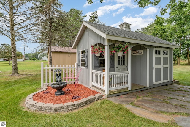 view of outdoor structure with a yard