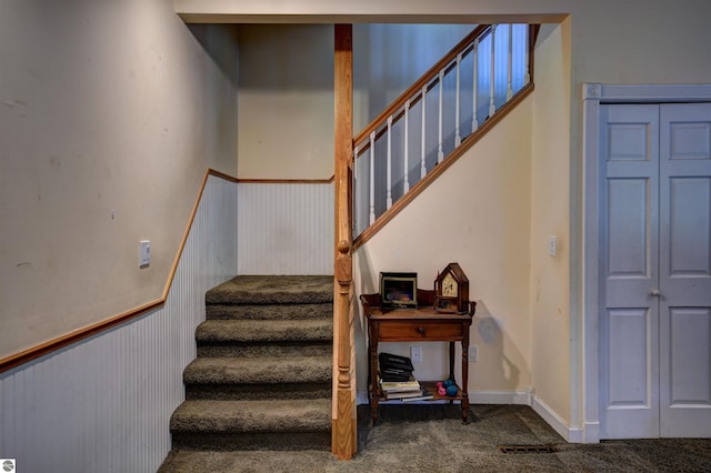 stairway with carpet flooring