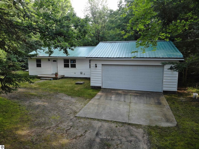 ranch-style home featuring a garage