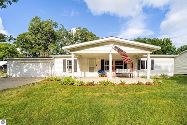 view of front facade with a garage and a front lawn