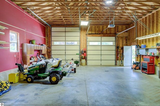 garage featuring a garage door opener