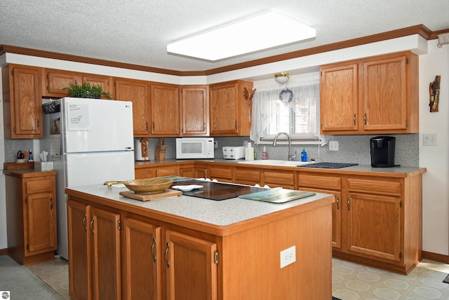 kitchen featuring light tile patterned flooring, white appliances, ornamental molding, sink, and a kitchen island