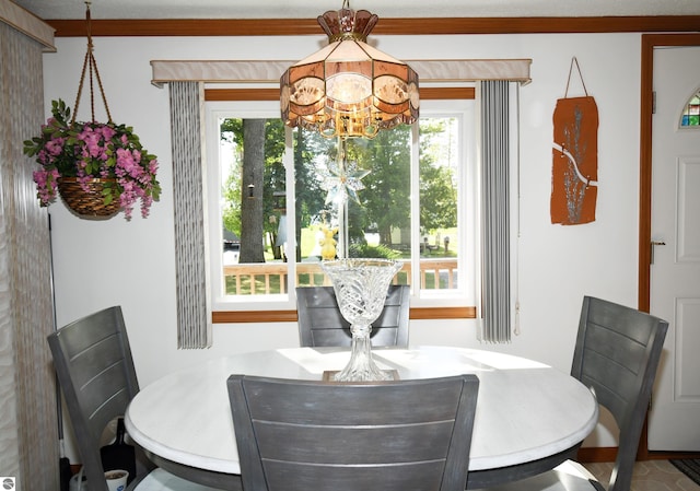 dining area featuring an inviting chandelier