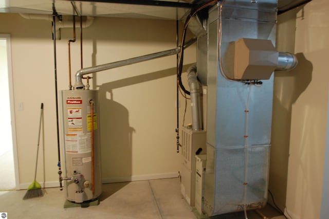 utility room with gas water heater