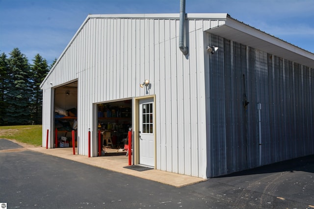 view of outbuilding with a garage