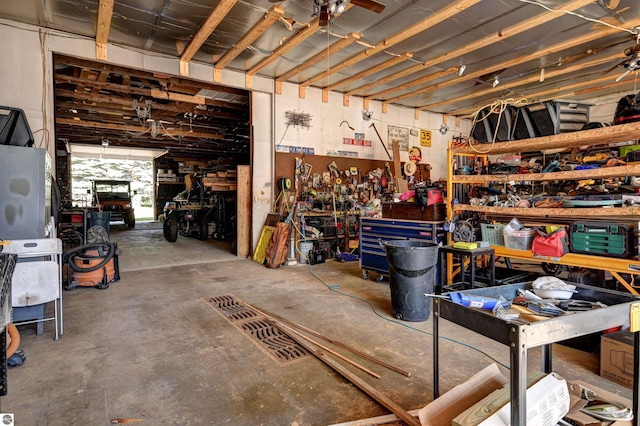 garage with a workshop area