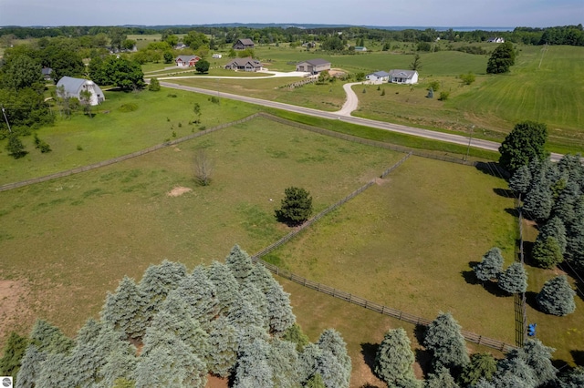 birds eye view of property featuring a rural view