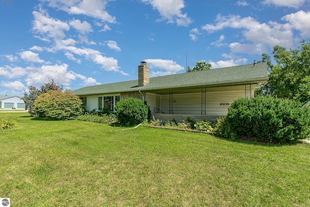 exterior space with a yard