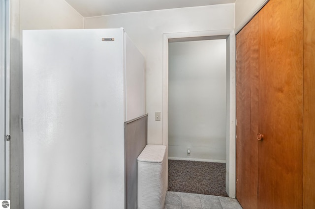 bathroom with tile patterned flooring