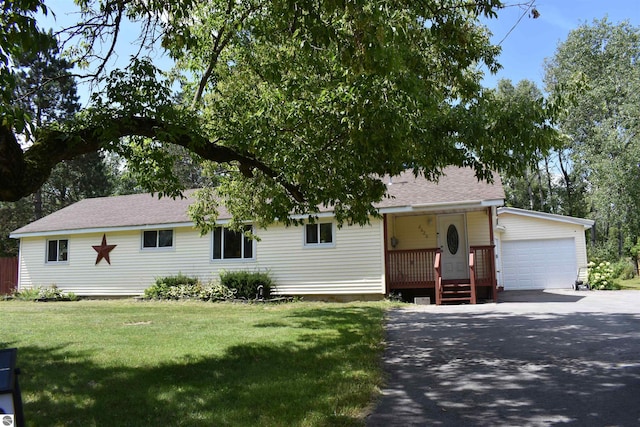 ranch-style home featuring a front yard