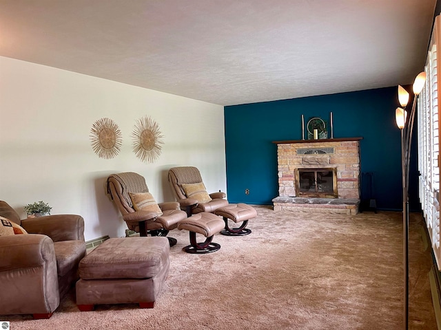 sitting room with a fireplace and carpet floors