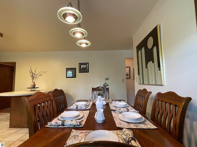 dining area with light tile patterned floors