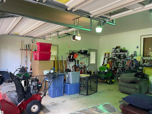 garage featuring a garage door opener