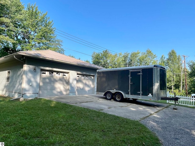 view of side of property with a lawn