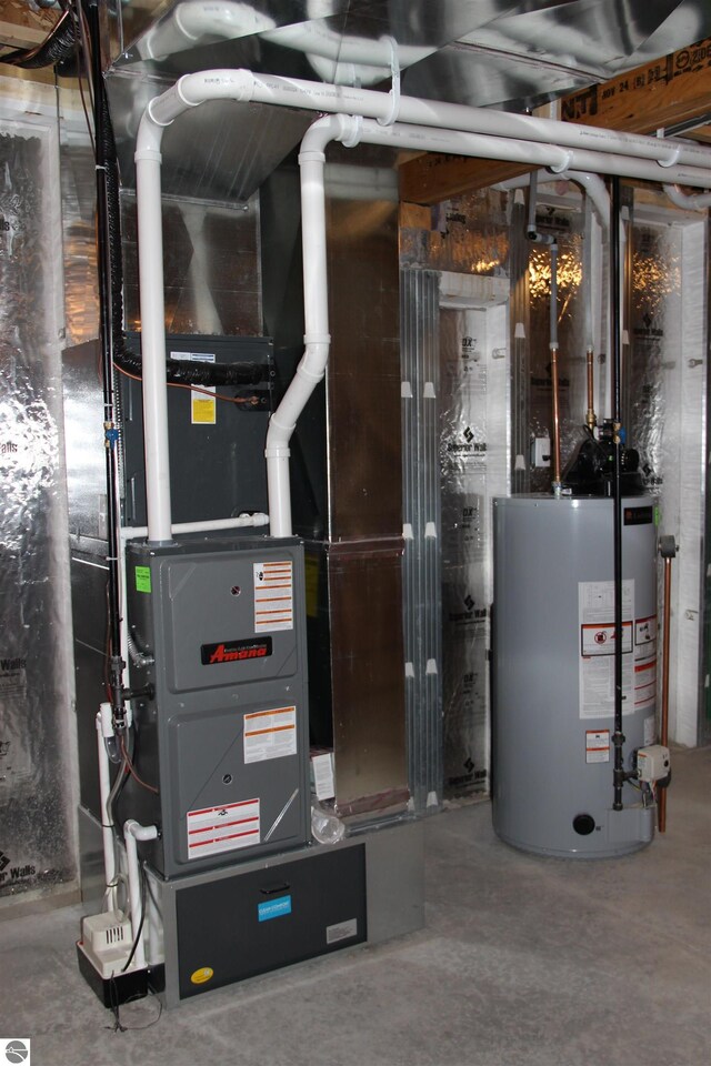 utility room with gas water heater