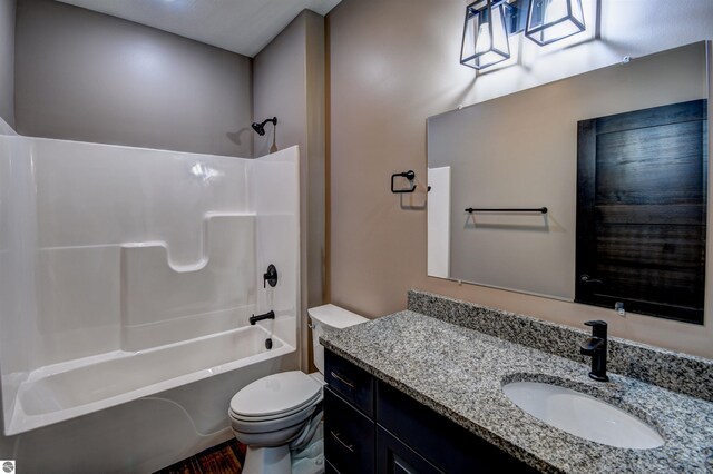 kitchen featuring appliances with stainless steel finishes, sink, dark hardwood / wood-style flooring, and a healthy amount of sunlight