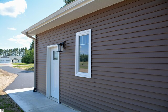 rear view of property with central air condition unit