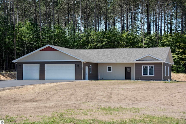 ranch-style house featuring a garage