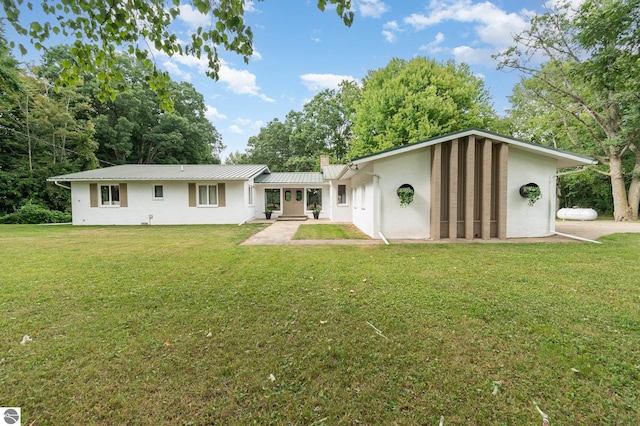 view of front of house with a front yard