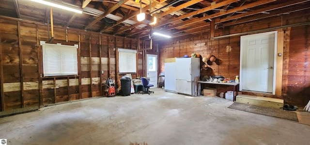 garage with white refrigerator