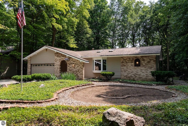 ranch-style home with a garage