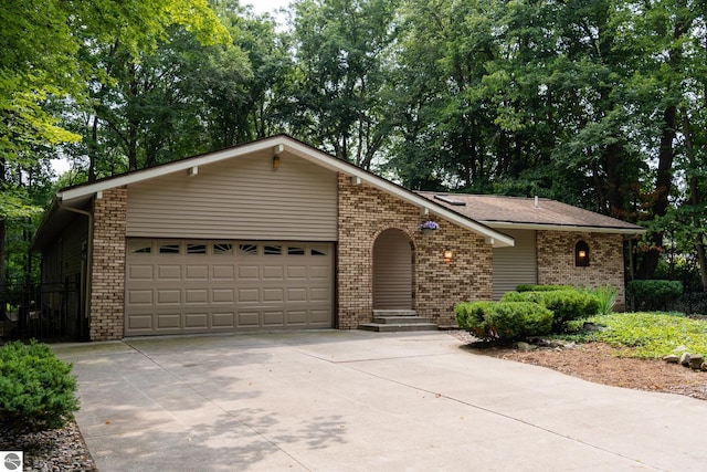 single story home with a garage