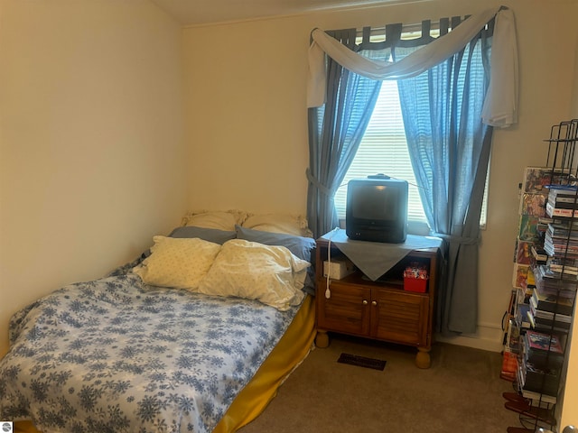 bedroom featuring carpet flooring