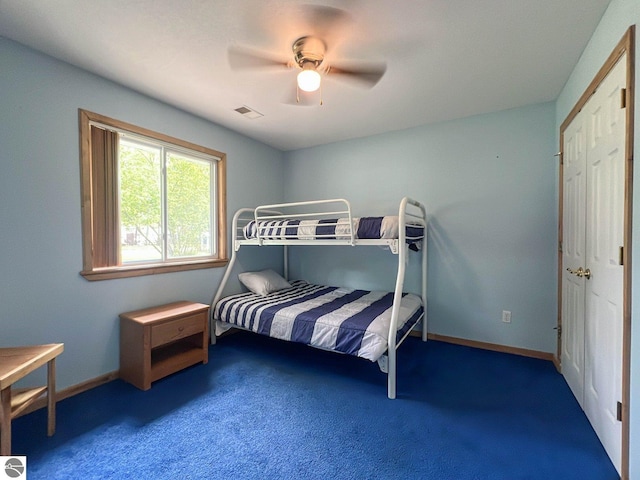 carpeted bedroom featuring ceiling fan