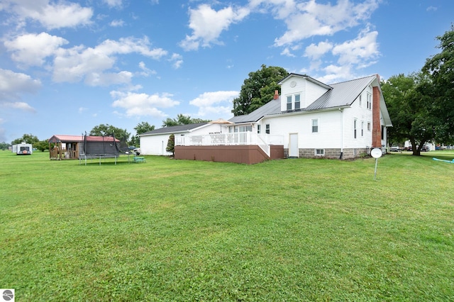 view of yard featuring a trampoline