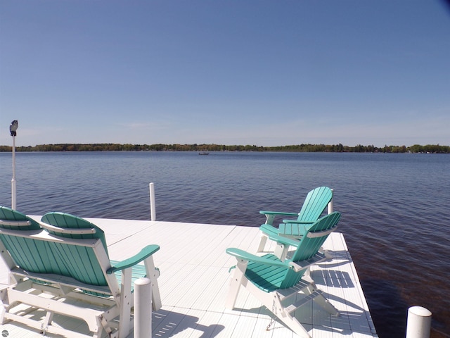 view of dock with a water view