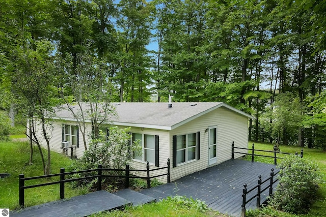 rear view of property with a deck