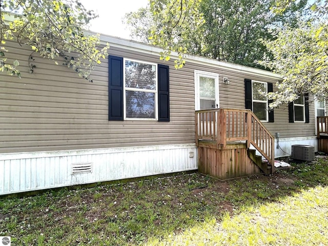 view of front of house with cooling unit