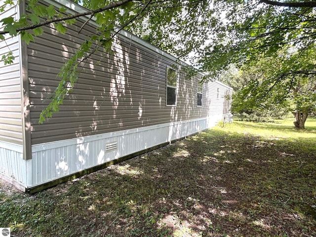 view of side of property with crawl space